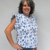 blue and white floral blouse