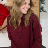 EXPOSED SEAM LONG SLEEVE TEXTURED KNIT POLO