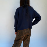 Leopard pants with floral embroidered hem