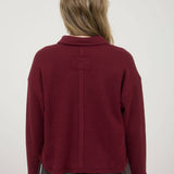 EXPOSED SEAM LONG SLEEVE TEXTURED KNIT POLO