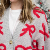 BOW PATTERN BUTTON DOWN KNIT CARDIGAN