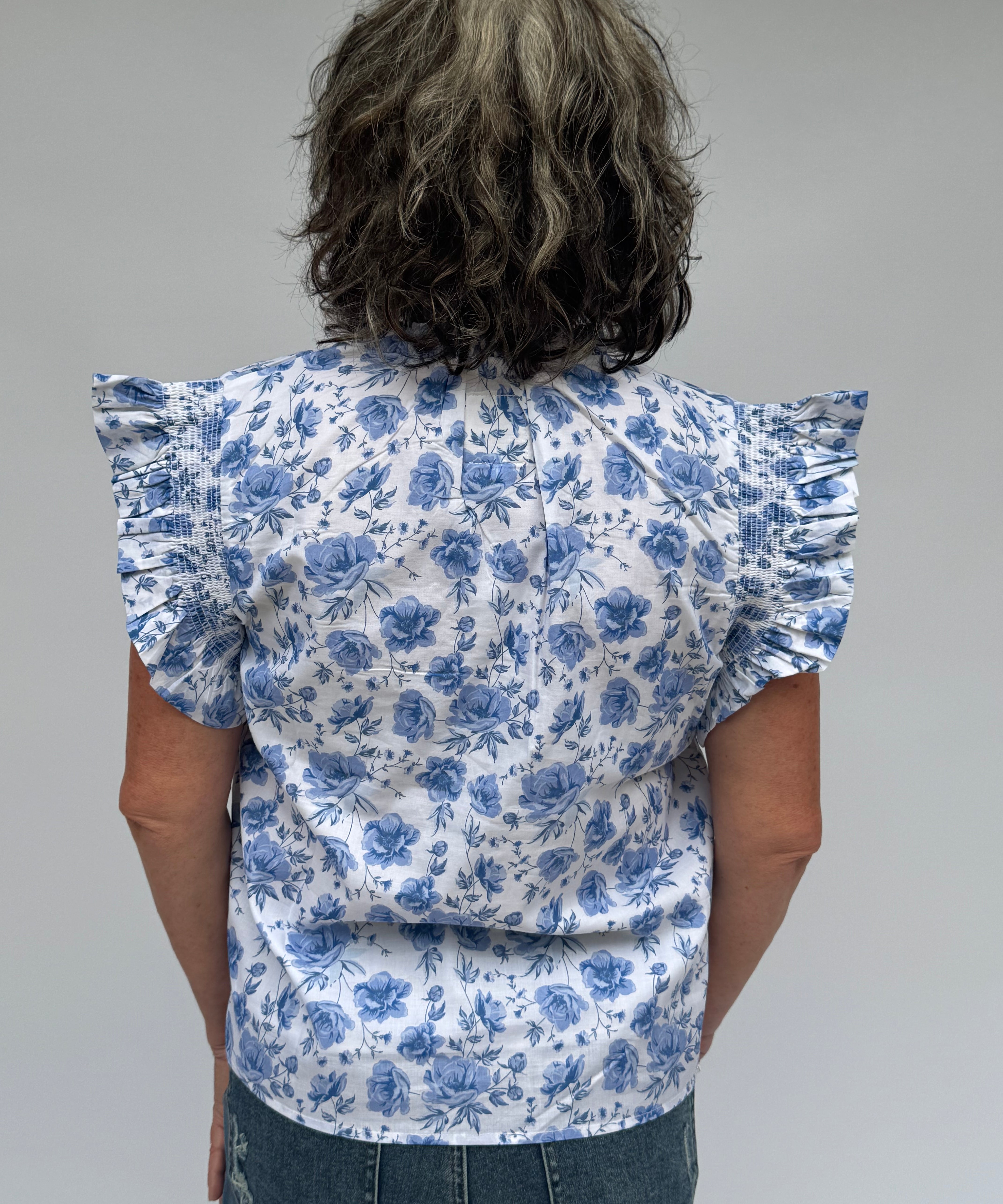 blue and white floral blouse