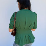 Pleated short sleeve flared hem top