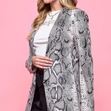 Snakeskin long sleeve suit coat blazer .